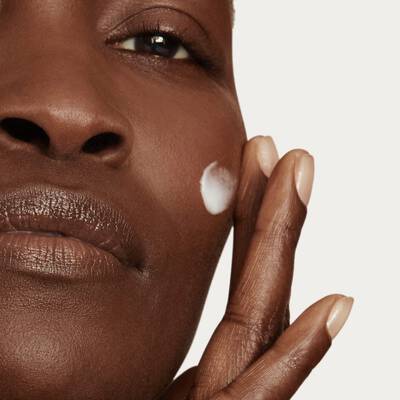 Close up model shot applying Nutrix Cream