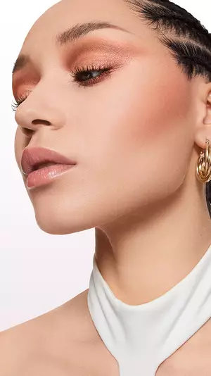 Face with the Peach Glow Look of Lancome