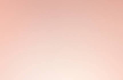 A close-up of a Lancome Nutrix Royal Body cream jar against a soft pink background. The jar features a gold lid and elegant branding.