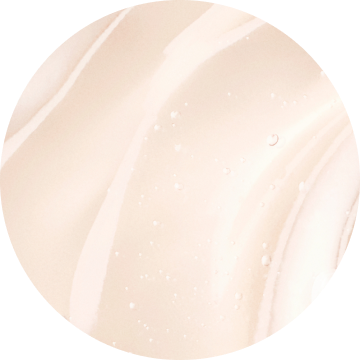 Close-up of soft, creamy beige marbled texture with subtle highlights and droplets, creating an elegant and smooth appearance.