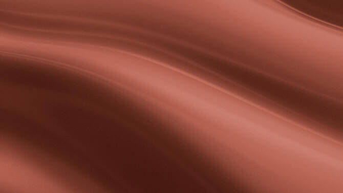 A smooth, wavy texture in warm brown tones, creating a soft and fluid appearance.